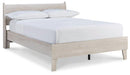 Ashley Furniture Socalle Panel Bed with a modern wooden frame and clean design, shown in a well-lit bedroom setting.