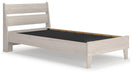 Ashley Furniture Socalle Panel Bed with a wooden headboard and footboard in a modern bedroom setting