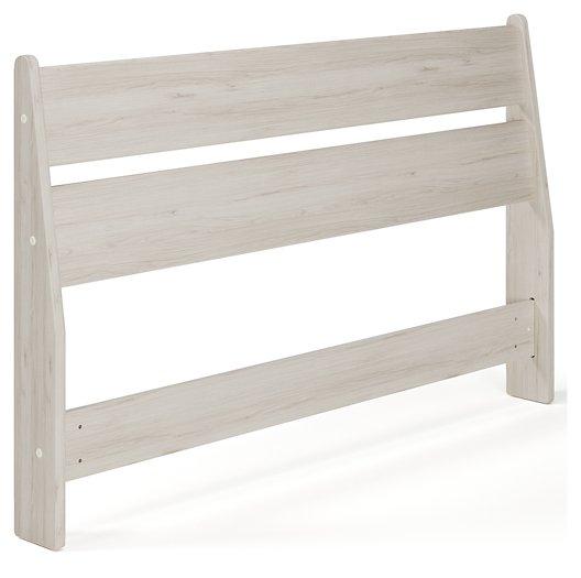 Ashley Furniture Socalle Panel Bed with a modern wood finish, showcasing the headboard and sturdy frame design.