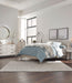 Ashley Furniture Socalle Panel Bed with sleek wood finish and modern design, shown in a well-lit bedroom setting.