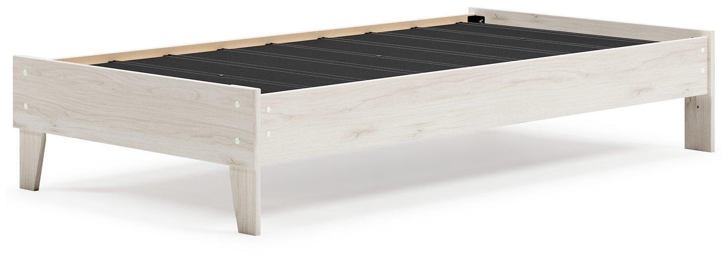 Ashley Furniture Socalle Panel Bed with a sleek wooden frame and modern headboard in a contemporary bedroom setting.