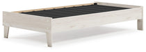 Ashley Furniture Socalle Panel Bed with a sleek wooden frame and modern headboard in a contemporary bedroom setting.