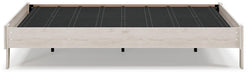 Ashley Furniture Socalle Panel Bed with a modern wooden design and clean lines, shown in a cozy bedroom setting.