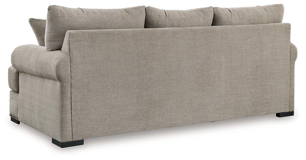 Ashley Furniture Galemore sofa with plush cushions and fabric upholstery, shown in a modern living room setting.