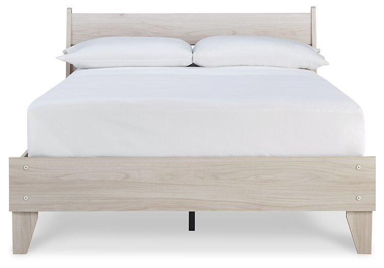 Ashley Furniture Socalle Panel Bed with a sleek wood finish, featuring a modern headboard and sturdy frame.