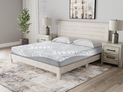 8-inch California King memory foam mattress by Ashley Furniture, showing plush surface with supportive foam layers.