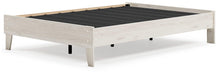 Ashley Furniture Socalle Panel Bed in warm wood finish with a classic headboard and sturdy frame, ideal for a cozy bedroom.