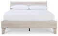 Ashley Furniture Socalle Panel Bed with a sleek wooden frame and modern design, shown in a well-lit bedroom setting.