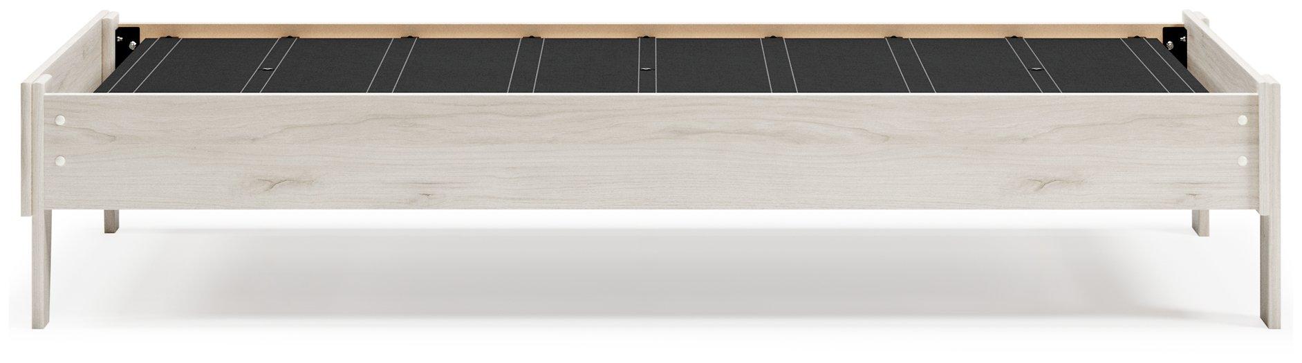 Ashley Furniture Socalle Panel Bed with a modern design, featuring a sturdy wooden frame and a sleek headboard.