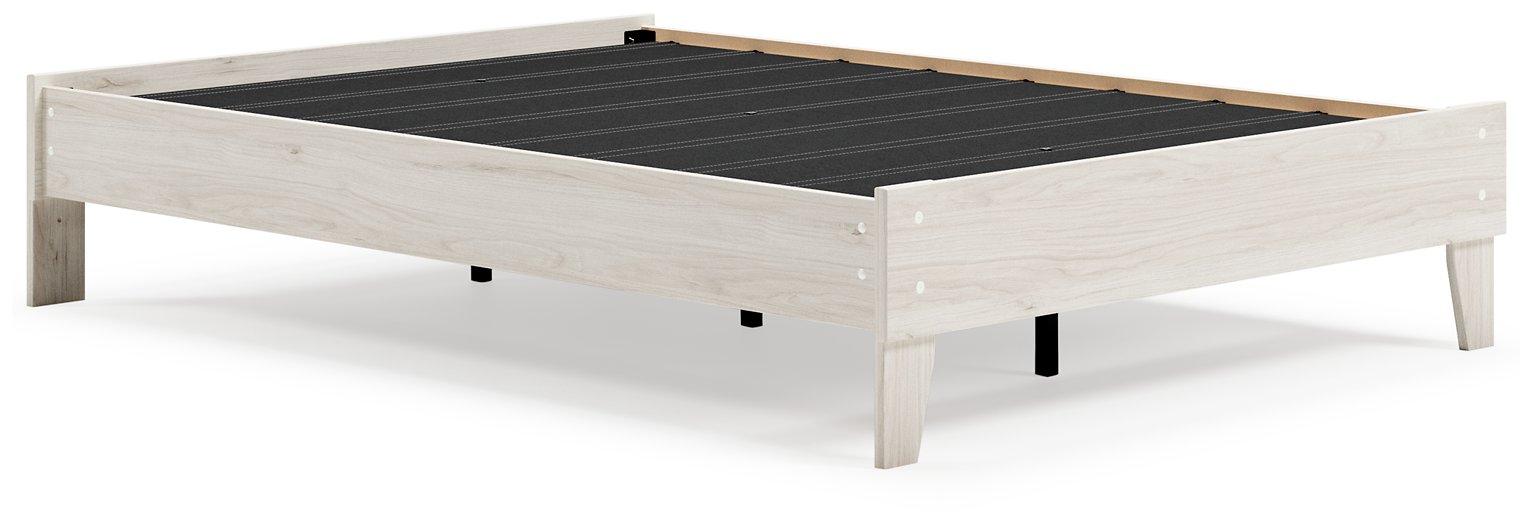 Ashley Furniture Socalle Panel Bed with wooden frame and headboard, showcasing a modern bedroom design with a neutral finish.