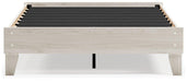 Ashley Furniture Socalle Panel Bed with a wooden frame and headboard, showcasing a modern design in a bedroom setting.