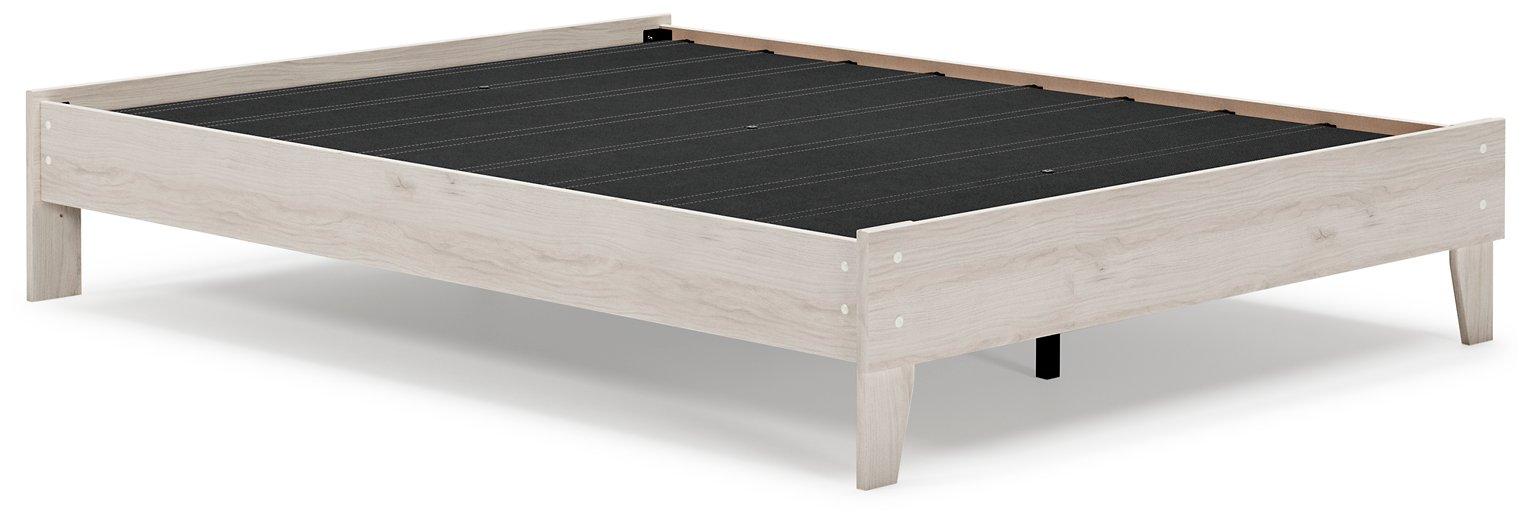 Ashley Furniture Socalle Panel Bed with a sleek wooden frame and headboard, showcasing a modern bedroom design.