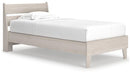 Ashley Furniture Socalle Panel Bed with a wooden frame, headboard with panel details, and a warm finish in a bedroom setting