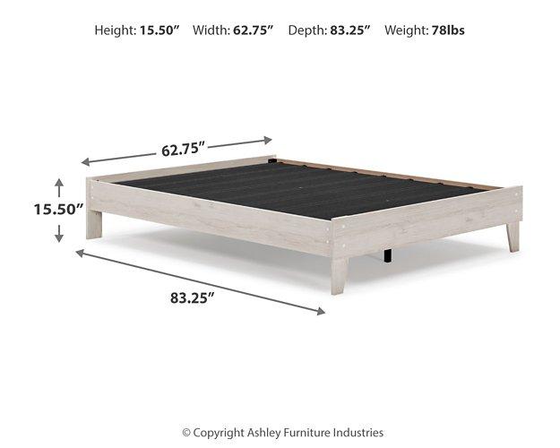 Ashley Furniture Socalle Panel Bed with a sleek wooden frame and headboard, showcasing a modern bedroom design.