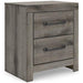 Graystorm bedroom set by Ashley Furniture featuring a bed frame, matching nightstands, and a dresser in a modern design