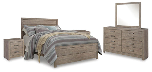 Ashley Furniture Culverbach youth bedroom set with a bed, nightstand, and dresser in a modern design, shown in a cozy bedroom setting.