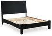 Ashley Furniture Danziar Bed with dark wood finish, shown from an angled view highlighting the headboard and frame design.