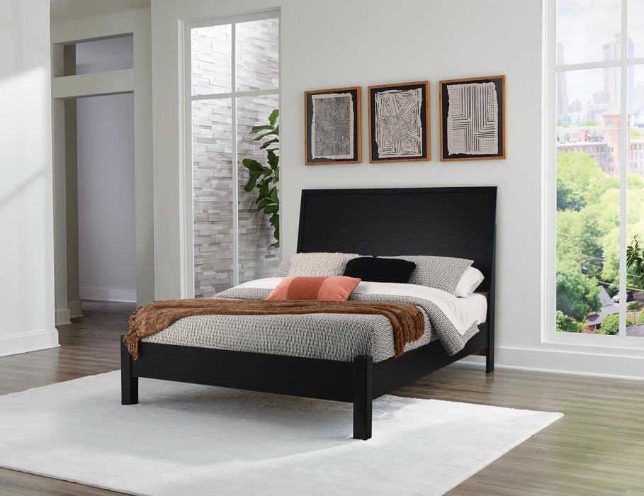 Ashley Furniture Danziar Bed with dark wood finish and modern design, featuring a sturdy frame and sleek headboard.