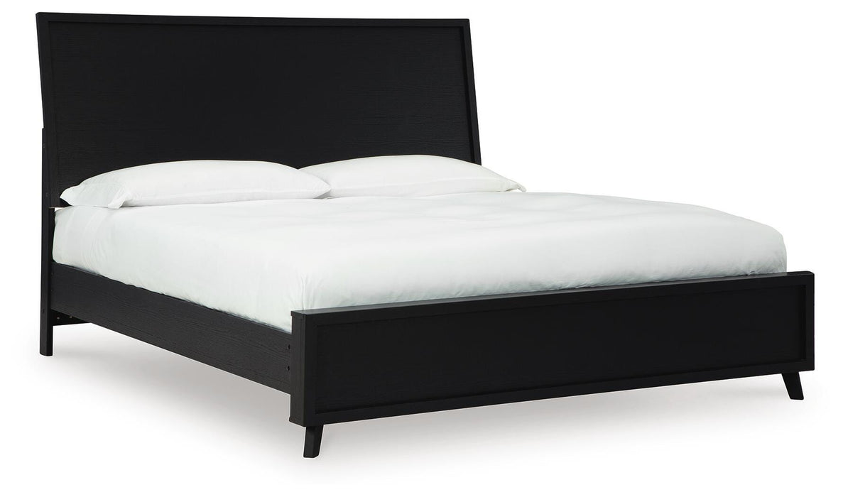 Ashley Furniture Danziar Bed with a modern frame, shown from a side angle featuring a sleek design and neutral finish.
