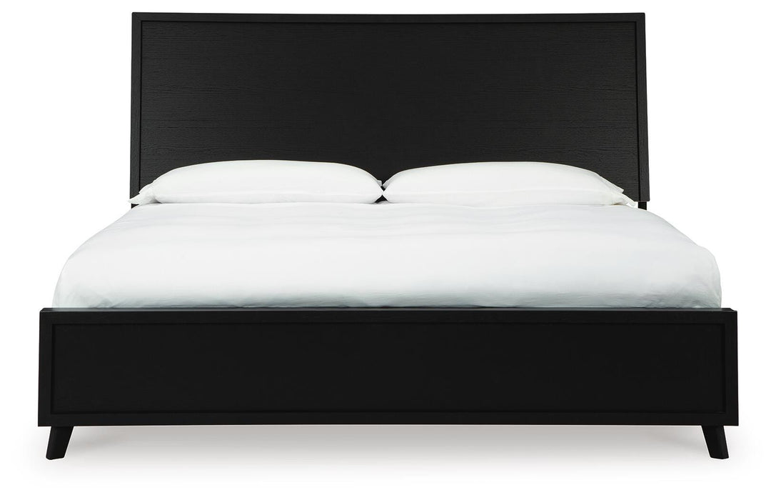 Ashley Furniture Danziar bed with a dark wood finish, featuring a headboard and sleek design.