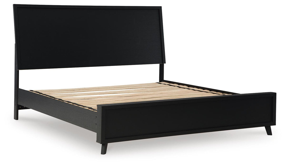 Ashley Furniture Danziar Bed with a modern frame and neutral upholstery, shown with a sleek headboard and stylish design.