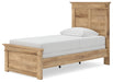 Ashley Furniture Makidern Bed with a stylish frame and neutral upholstery, shown from an angled view.