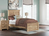 Ashley Furniture Makidern Bed with a wooden frame and upholstered headboard, showcasing a modern bedroom design.