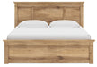 Ashley Furniture Makidern Bed with a headboard featuring a sleek, modern design and neutral upholstery.