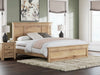 Ashley Furniture Makidern Bed with upholstered headboard and wooden frame, shown in a cozy bedroom setting