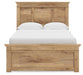 Ashley Furniture Makidern Bed with a sleek headboard, showcasing a modern design in a stylish bedroom setting.
