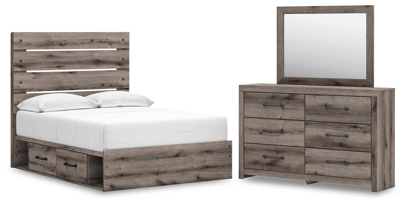 Graystorm bedroom set by Ashley Furniture featuring a bed, nightstands, and matching dresser in a modern gray finish.