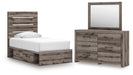 Graystorm bedroom set by Ashley Furniture featuring a bed, nightstands, and dresser in a modern gray finish