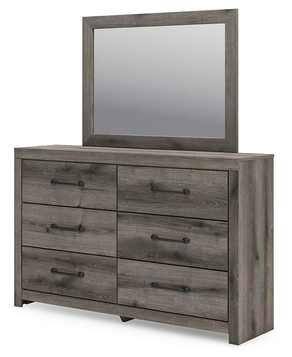 Ashley Furniture Graystorm bedroom set with a bed, matching nightstands, and dresser in a modern gray finish.