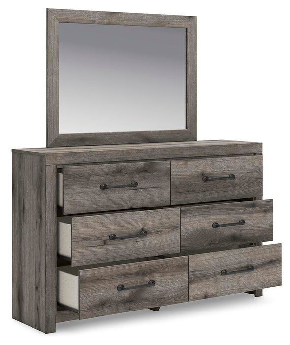 Graystorm bedroom set by Ashley Furniture, featuring a modern bed frame, matching nightstands, and dresser in a cozy gray finish.