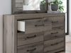 Graystorm bedroom set by Ashley Furniture featuring a modern bed frame, matching nightstands, and coordinated bedroom decor.