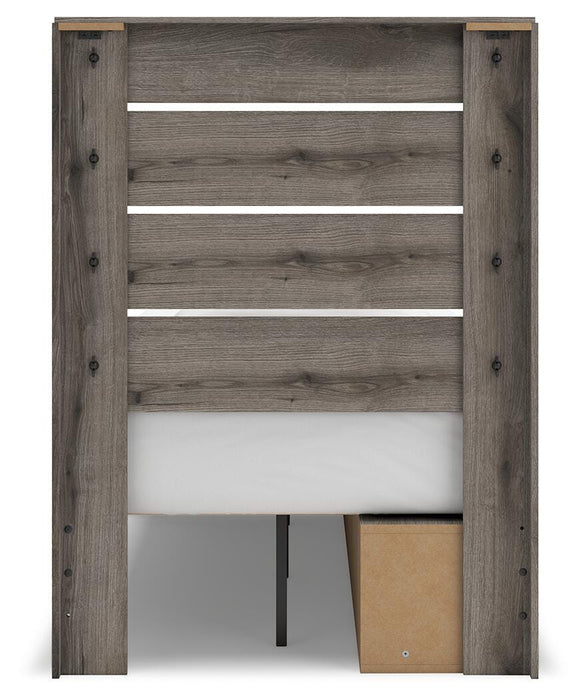 Graystorm bedroom set by Ashley Furniture featuring a bed frame, matching nightstands, and bedroom decor in a modern design.