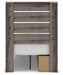 Graystorm bedroom set by Ashley Furniture featuring a bed frame, matching nightstands, and bedroom decor in a modern design.