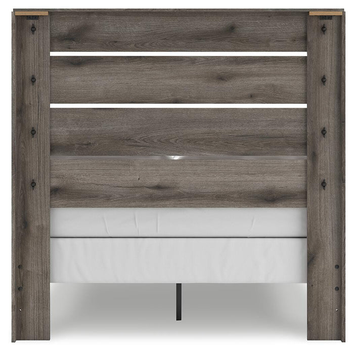 Gray Ashley Furniture bedroom set with bed, dresser, and nightstands, featuring a modern design and neutral gray finish.