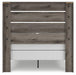 Gray Ashley Furniture bedroom set with bed, dresser, and nightstands, featuring a modern design and neutral gray finish.