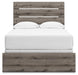 Gray Ashley Furniture Bedroom Set with headboard and matching furniture pieces in a modern design.