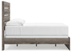 Graystorm bedroom set by Ashley Furniture, including bed frame, nightstands, and dresser, displayed in a modern bedroom setting.