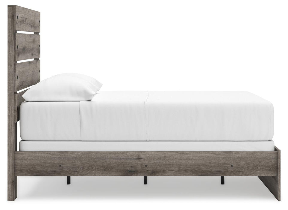 Graystorm bedroom set by Ashley Furniture, including bed frame, nightstands, and dresser, displayed in a modern bedroom setting.