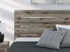 Graystorm bedroom set by Ashley Furniture featuring a bed, nightstands, and matching dresser with modern gray finish.
