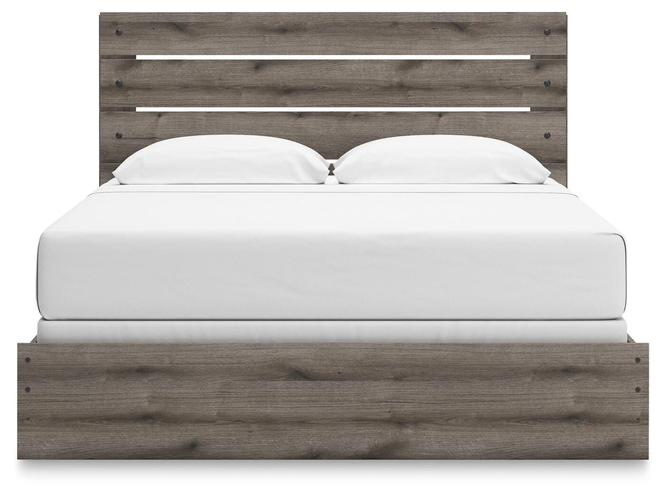 Graystorm bedroom set by Ashley Furniture featuring a modern bed frame with matching nightstands and dresser in a sleek gray finish.