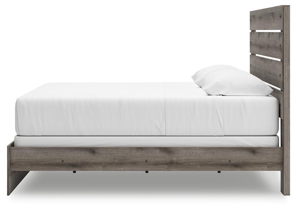 Graystorm bedroom set by Ashley Furniture, featuring a modern bed frame, matching nightstands, and coordinating bedroom furniture.