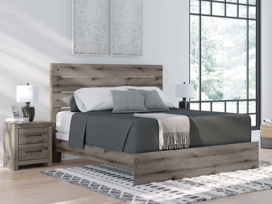 Graystorm bedroom set by Ashley Furniture featuring a modern bed frame, matching nightstands, and coordinated decor.