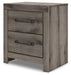 Graystorm bedroom set by Ashley Furniture, featuring a bed, nightstands, and dresser in a modern gray finish, shown from an angle.