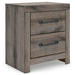 Ashley Furniture Graystorm bedroom set with a modern bed frame, matching nightstands, and dresser in a stylish bedroom scene.