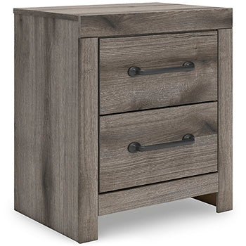 Ashley Furniture Graystorm bedroom set featuring a modern bed frame, matching nightstands, and coordinated bedroom furniture.