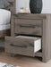 Graystorm bedroom set by Ashley Furniture featuring a modern bed frame, matching nightstands, and coordinated bedroom furniture.